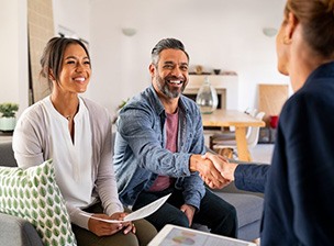 a couple speaking with a professional 